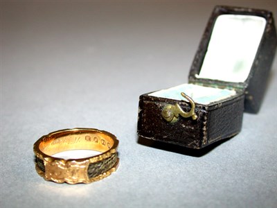 Lot 20 - Gold Memorial Ring The antique yellow gold...