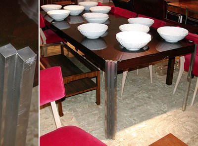 Lot 149 - Mahogany and Chrome Dining Table With two leaves.