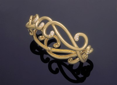 Lot 207 - Angela Cummings 18 kt. Yellow Gold and Diamond Large Arabesque Bracelet