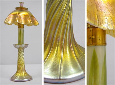 Lot 861 - Tiffany Favrile Glass Candlestick Lamp In gold...