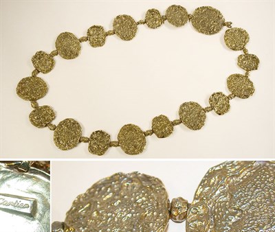 Lot 948 - Cartier Hammered Sterling Gold Wash Belt