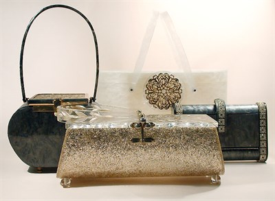 Lot 869 - Four Lucite Handbags