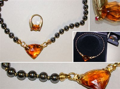 Lot 293 - Hematite and Citrine Necklace and Citrine Ring