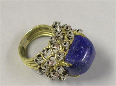 Lot 479 - Cabochon Lapis Lazuli and Diamond Ring