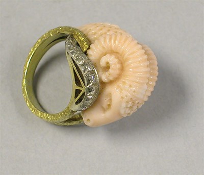 Lot 305 - Carved Coral and Diamond Ring