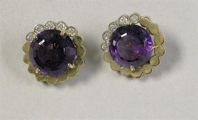 Lot 311 - Pair of Amethyst and Diamond Earrings