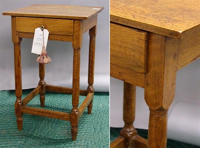 Lot 262 - Walnut One-Drawer Stand The rectangular top...