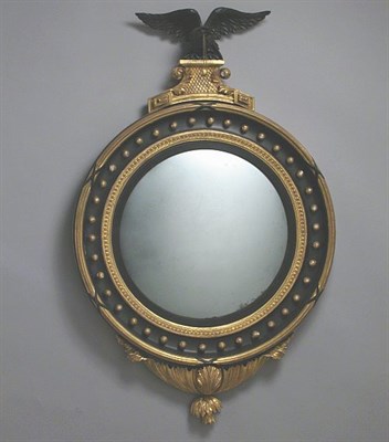Lot 206 - Regency Gilt and Black Painted Convex Mirror...