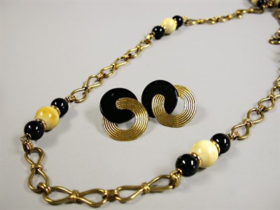 Lot 132 - Ivory and Black Onyx Necklace and Pair of Earrings