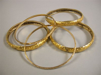 Lot 254 - Group of Gold Bangle Bracelets