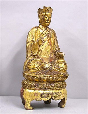 Lot 162 - Chinese Gilt Decorated Lacquered Figure of...
