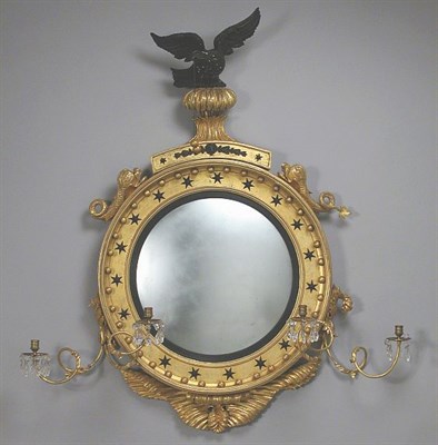 Lot 297 - Regency Black Painted and Gilt-Wood Convex...