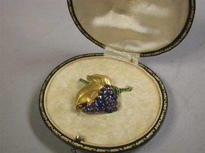 Lot 355 - Gold, Sapphire and Emerald Leaf Pin