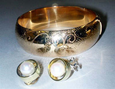 Lot 331 - Gold Bangle Bracelet and Pair of Earclips