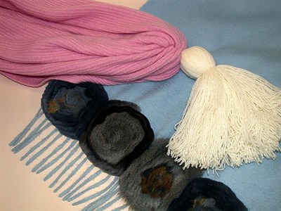 Lot 679 - Four Wool Wraps Comprising one of rose pink...