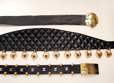 Lot 3782 - Three Black Leather and Gilt-Metal Chanel Belts