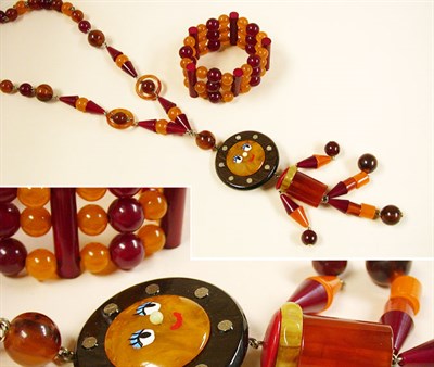 Lot 899 - Bakelite Dangling Man Suite