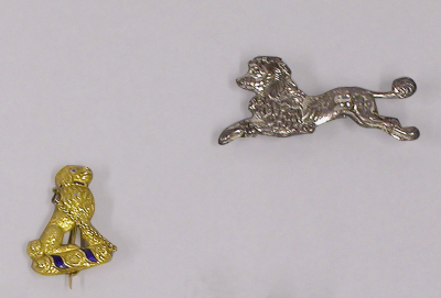 Lot 44 - Gold Poodle Pin with Blue Enamel Decoration...