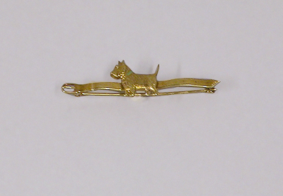 Lot 49 - Gold and Enamel Scottish Terrier Form Pin