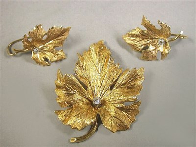 Lot 55 - Leaf Pin and Pair of Earrings