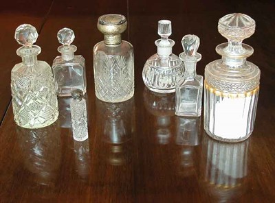 Lot 2232 - Group of Seven Colorless Cut Glass Dresser...