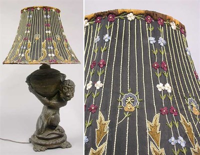 Lot 836 - Patinated-Metal Fluid Lamp Molded as a monkey...