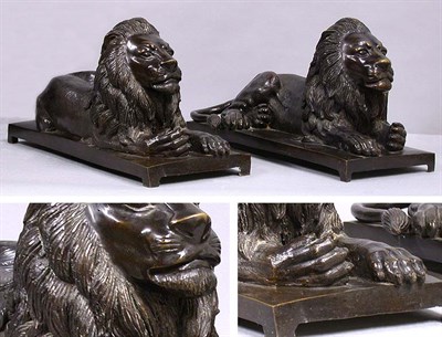 Lot 257 - Pair of Patinated-Bronze Recumbent Lions