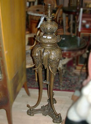 Lot 833 - Chinese Bronze Fluid Lamp Cast as three...