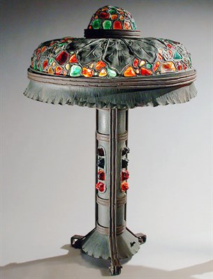 Lot 844 - Austrian Bronze and Glass Lamp The stepped...