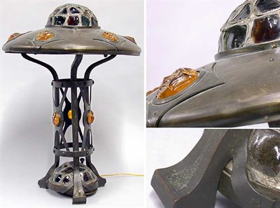 Lot 840 - Austrian Bronze and Glass Lamp The stepped...
