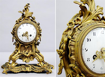 Lot 392 - Louis XV Style Bronze Clock Height 13 3/4 inches.