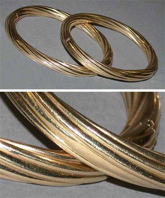 Lot 329 - Two Gold Bangle Bracelets