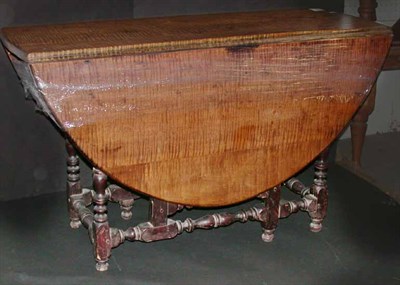 Lot 179 - Queen Anne Maple and Birch Gate Leg Table The...