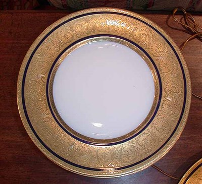 Lot 424 - Set of Twelve Limoges Gilt Decorated Porcelain...