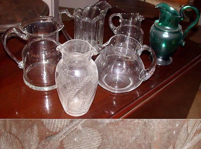 Lot 207 - Group of Six Colorless and Green Glass Pitchers