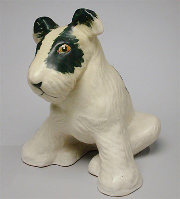 Lot 1038 - Weller Pottery Figure of a Seated Terrier...