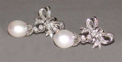 Lot 234 - Pair of Cultured Pearl and Diamond Pendant Earrings
