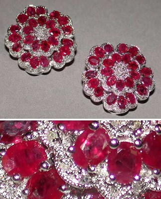 Lot 475 - Pair of Ruby and Diamond Flower Earclips