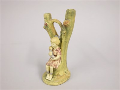 Lot 1066 - Weller Pottery Vase Molded as a girl with a...