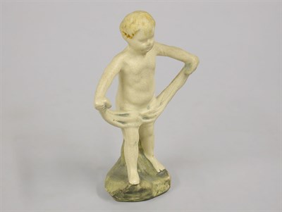 Lot 1071 - Weller Pottery Figure of a Boy Holding a drape....
