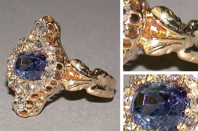 Lot 586 - Diamond and Blue Stone Ring