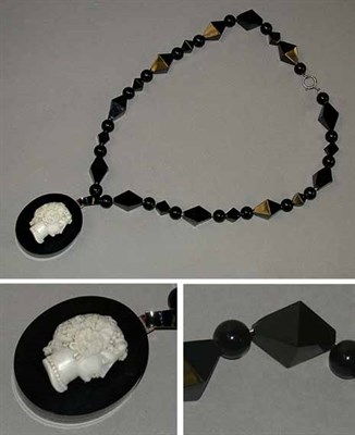 Lot 296 - Onyx Bead Necklace with Cameo Pendant