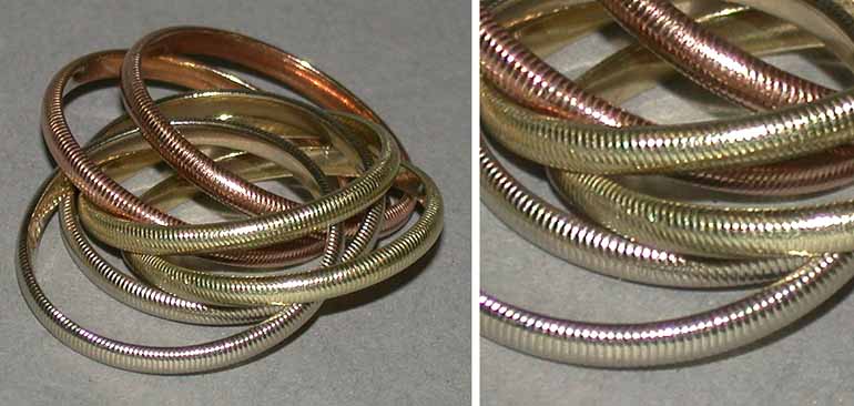 Lot 43 - Tricolor Gold Rolling Ring