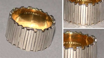 Lot 133 - Platinum and Gold Wedding Band