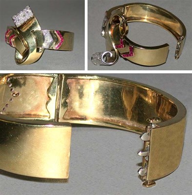 Lot 579 - Diamond and Ruby Bangle Bracelet