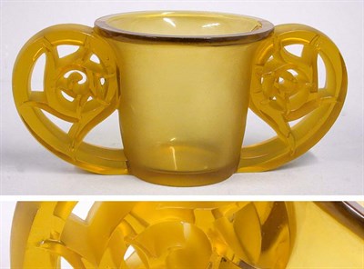 Lot 797 - R. Lalique Amber Glass Pierrefonds Two-Handled...