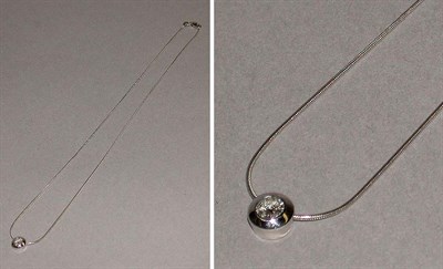 Lot 560 - Diamond Pendant and Chain