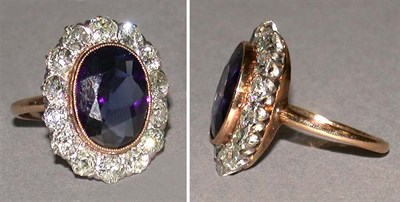 Lot 406 - Diamond and Blue Stone Ring