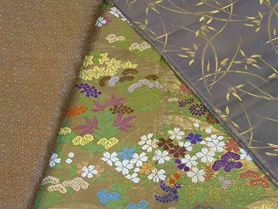 Lot 2410 - Three Oriental Silk Obis Early 20th century...