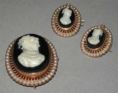 Lot 580 - Three Black Onyx Cameo Pins